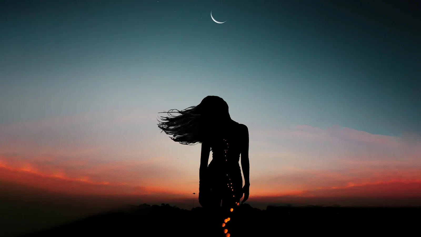 image of woman with night skyline background